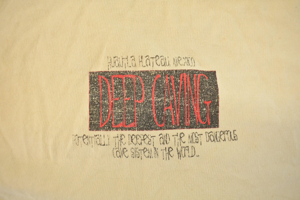 Vintage 1990s Deep Caving What Doesn't Kill You Makes You Stronger Single Stitch Graphic T Shirt Men's XL from propervintagecanada