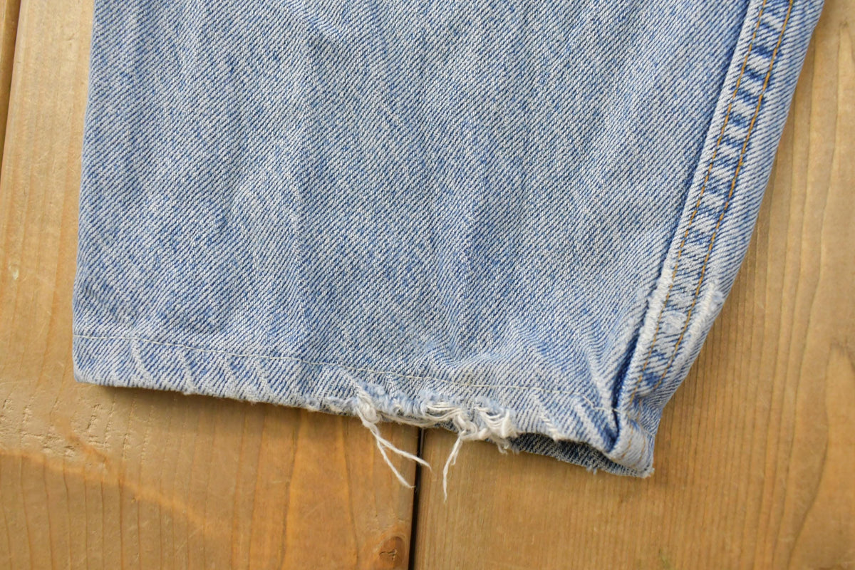 Vintage 1990s Distressed Levi's 560 Loose Fit Denim Blue Jeans Men's 32 x 26.5