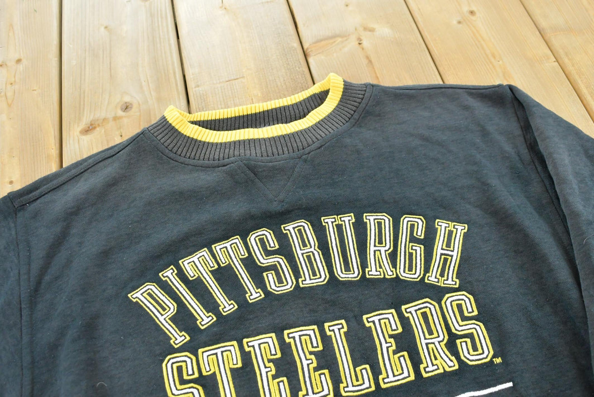 Vintage 1990s Faded Logo Athletic Pittsburgh Steelers Embroidered Sweatshirt Men's XL