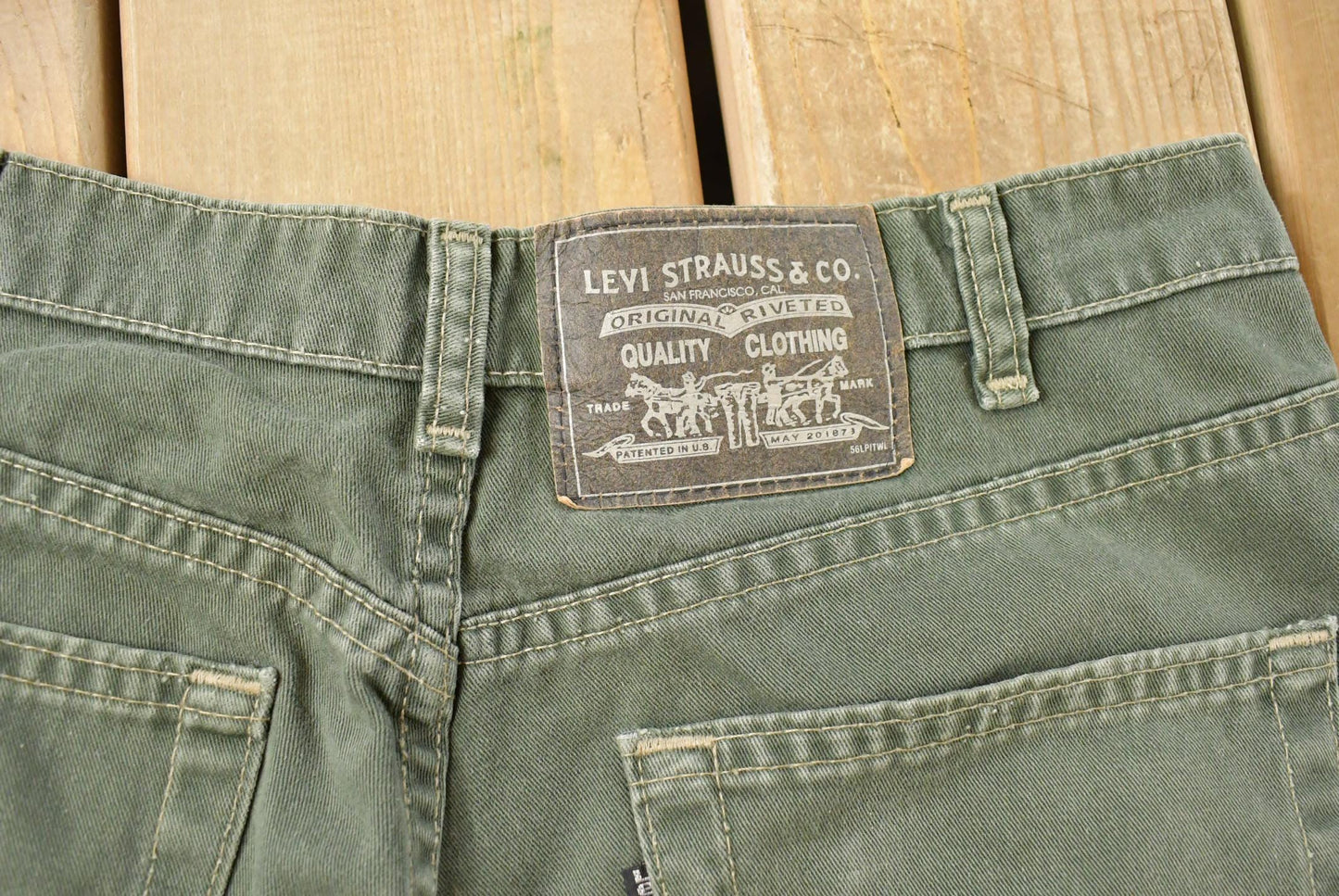 Vintage 1990s Levi's Green Denim Jean Shorts Men's 31