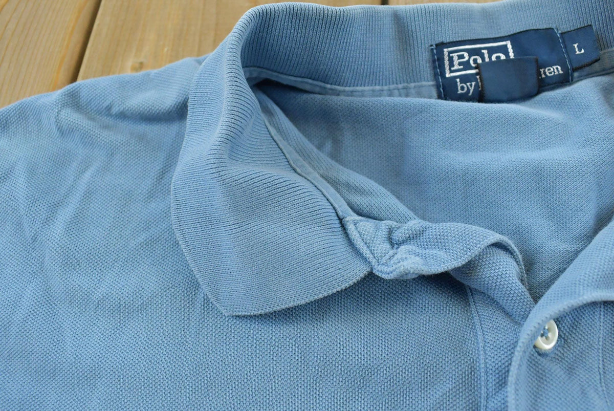 Vintage 1990s Polo By Ralph Lauren Blank Blue Small Pony Short Sleeve Polo Shirt Men's XL