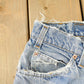 Vintage 1990s Distressed Levi's 560 Loose Fit Denim Blue Jeans Men's 32 x 26.5