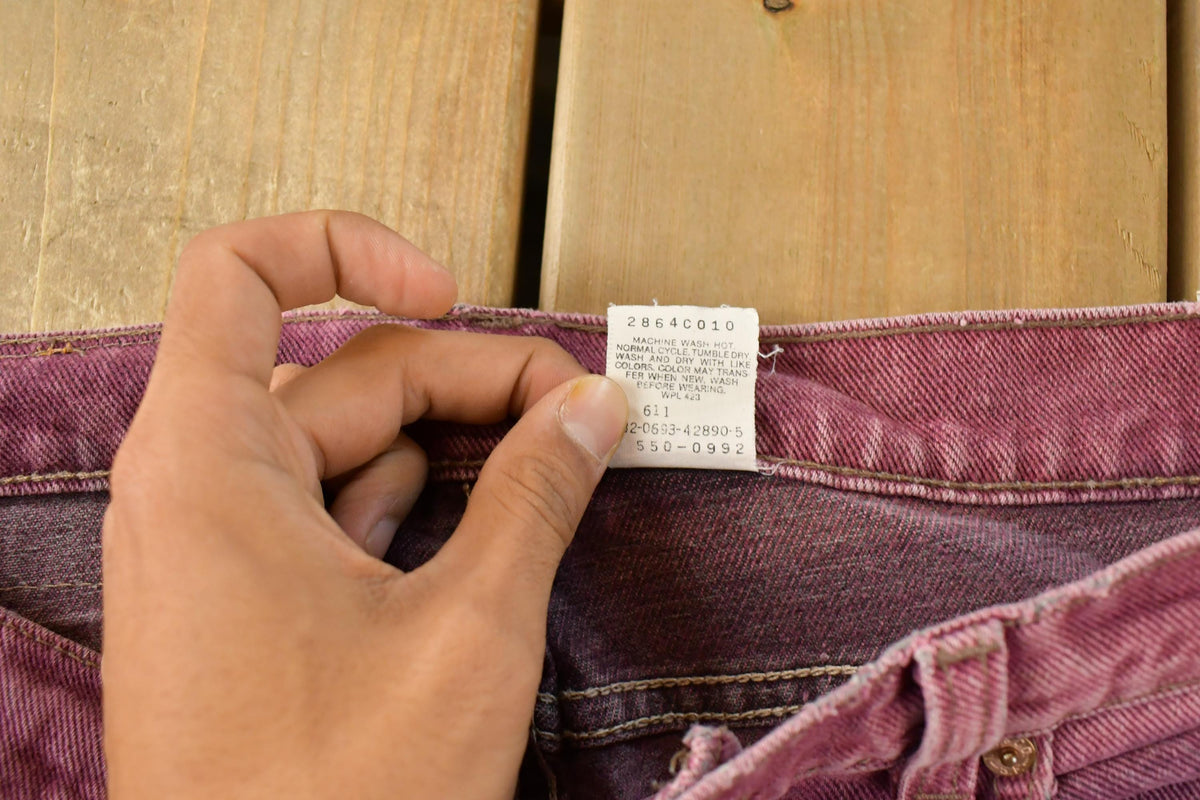 Vintage 1990s Distressed Levi's 550 Relaxed Tapered Fit Denim Jeans Men's 33 x 31