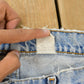 Vintage 1990s Distressed Levi's 560 Loose Fit Denim Blue Jeans Men's 32 x 26.5