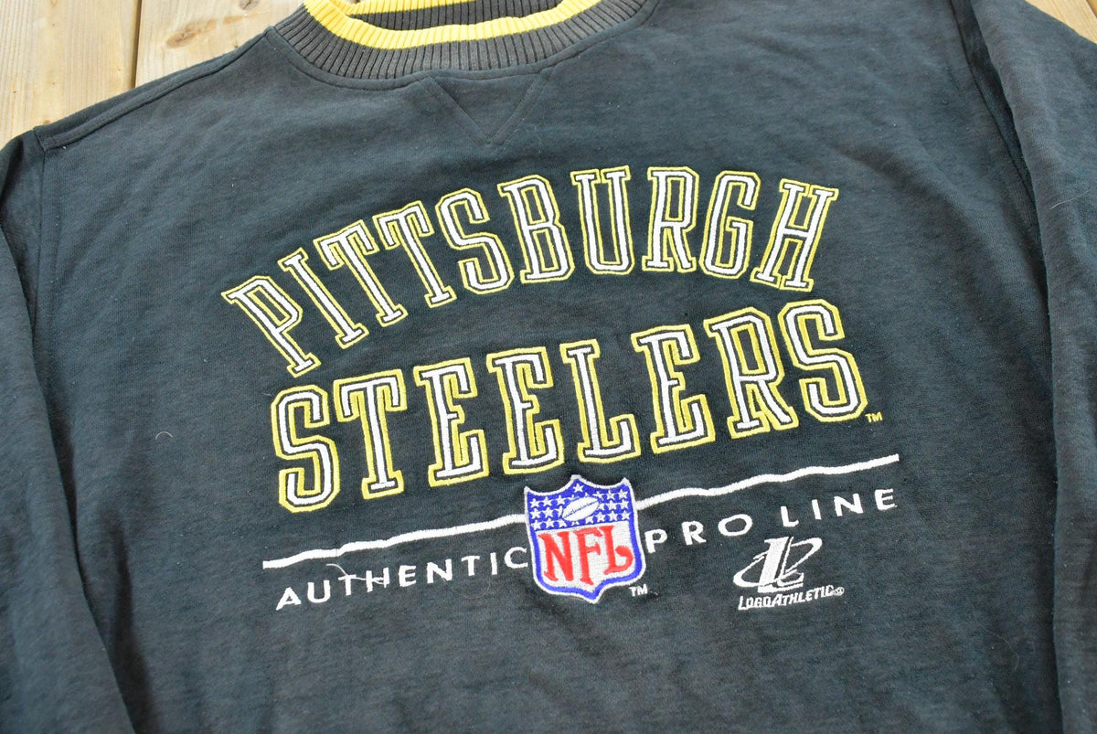 Vintage 1990s Faded Logo Athletic Pittsburgh Steelers Embroidered Sweatshirt Men's XL