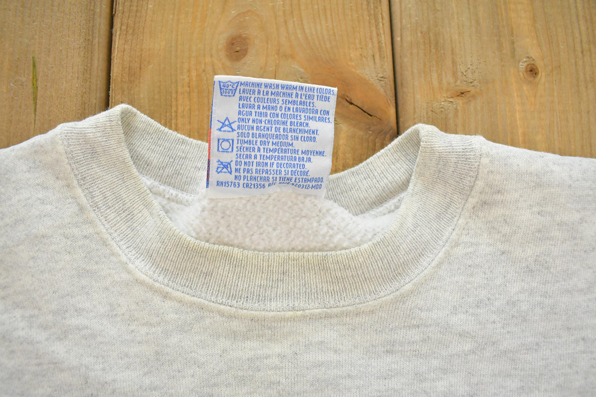 Vintage 1990s Hutch Hockey Graphic Collegiate Crewneck Sweatshirt Men's M