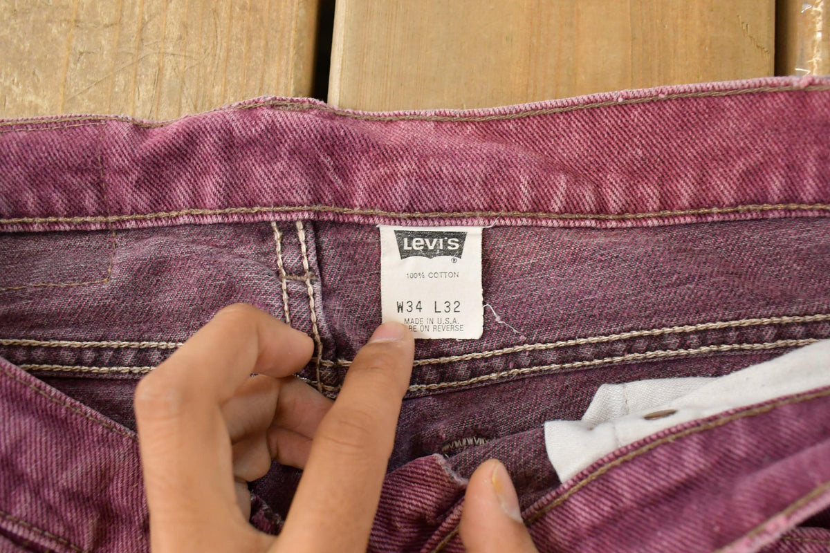 Vintage 1990s Distressed Levi's 550 Relaxed Tapered Fit Denim Jeans Men's 33 x 31