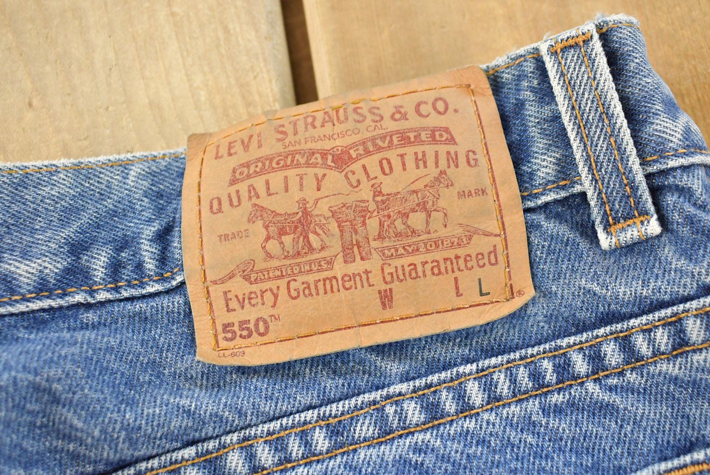 Vintage 1990s Levi's Distressed 550 Relaxed Fit Denim Jeans Women's 33 x 32.5