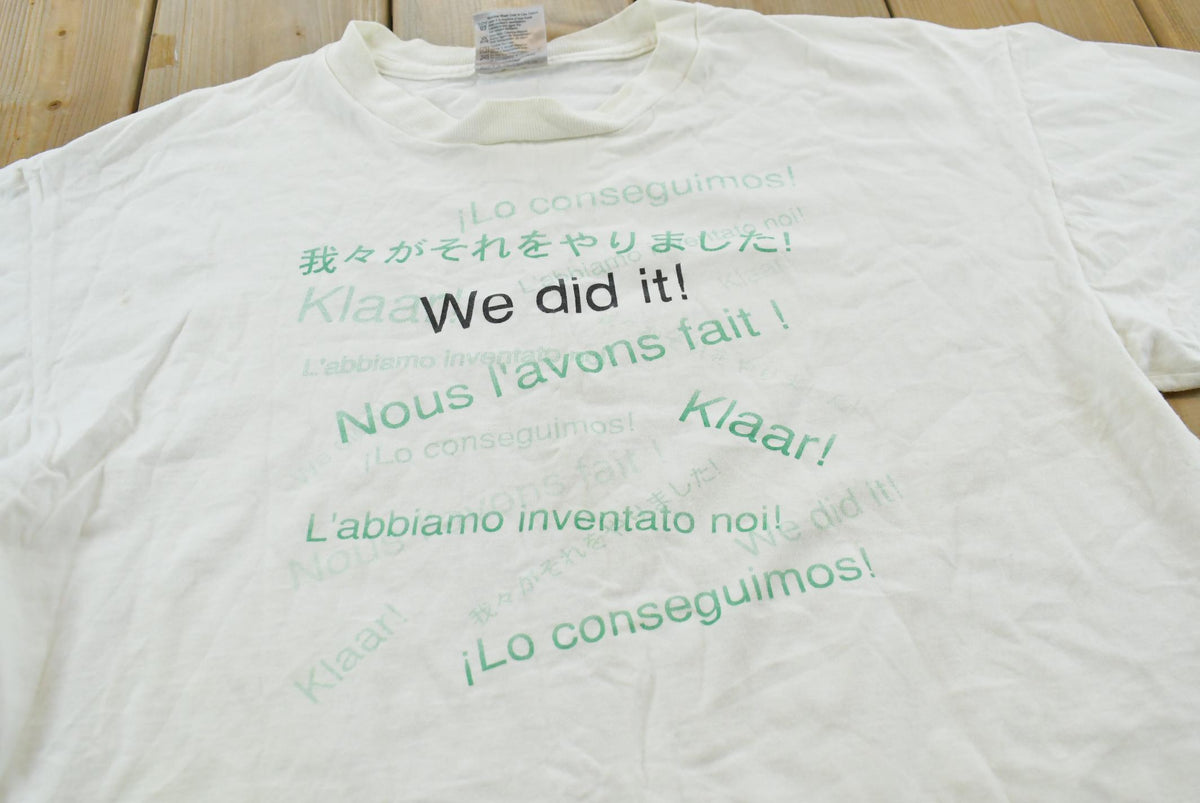 Vintage 1990s We Did It Multiple Languages Translation Promotional T-Shirt Men's L