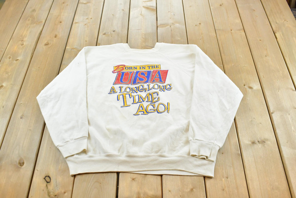 Vintage 1980s Tultex Born In The USA A Long Time Ago Souvenir Raglan Crewneck Sweatshirt Men's M / Made in USA / 80s Streetwear