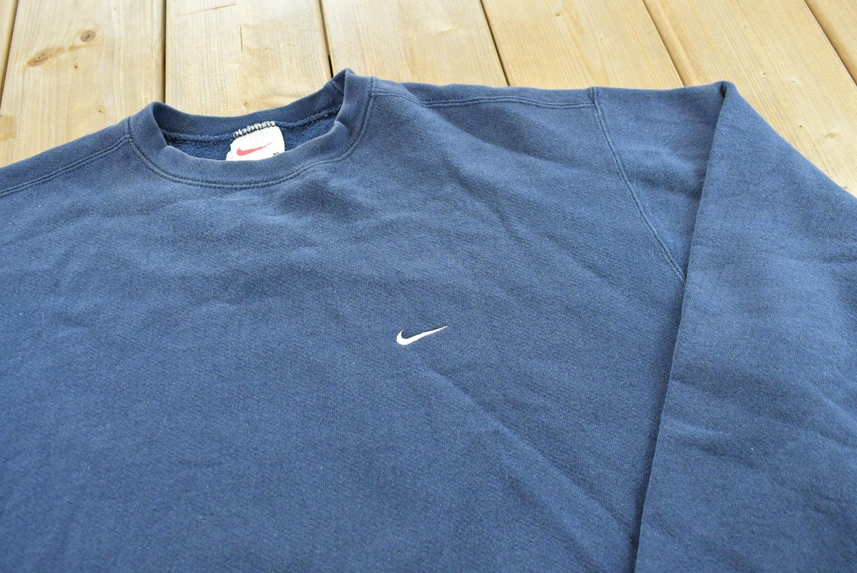 Vintage 1990s Nike Embroidered Mini Swoosh Blue Crewneck Sweatshirt Men's XL
