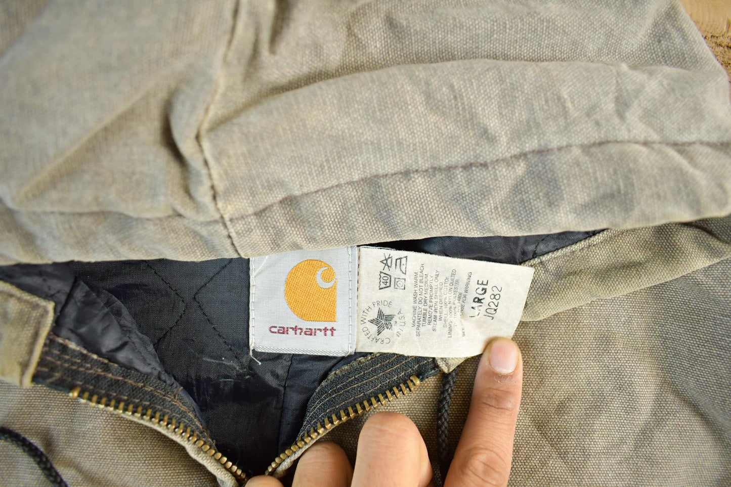 Carhartt Clothing > Gender Neutral Adult Clothing > Jackets & Coats Vintage 1980s Carhartt Sun Faded Distressed Canvas Hooded Work Jacket Men's Large