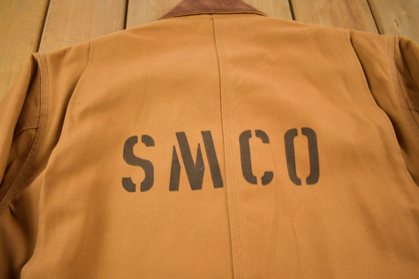 Carhartt Clothing > Gender Neutral Adult Clothing > Jackets & Coats Vintage 1980s Deadstock Carhartt SMCO Blanket Lined Chore Coat Workwear Men's XL