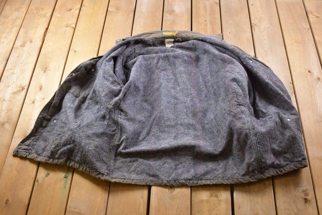 Carhartt Clothing > Gender Neutral Adult Clothing > Jackets & Coats Vintage 1990s Carhartt Blanket Lined Chore Coat Men's Large