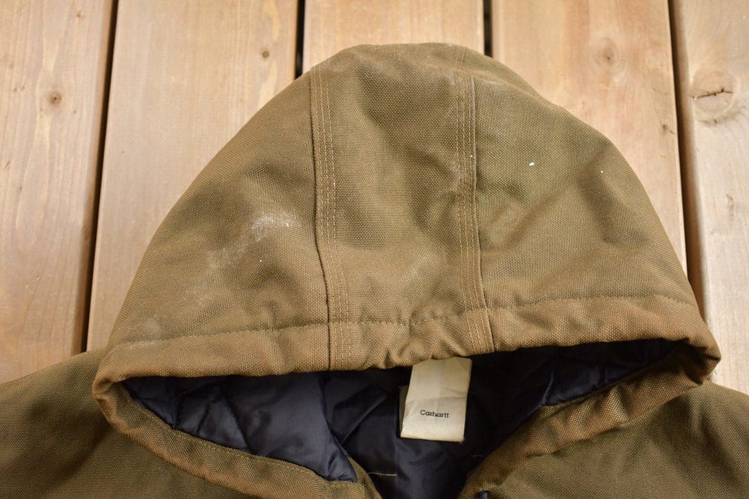 Carhartt Clothing > Gender Neutral Adult Clothing > Jackets & Coats Vintage 1990s Carhartt Hooded Work Jacket Men's 3XL