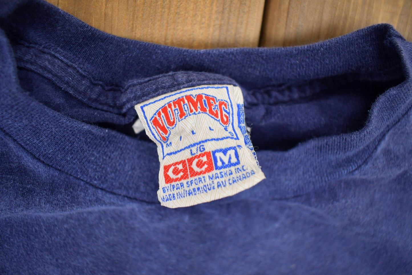 CCM Clothing > Gender Neutral Adult Clothing > Tops & Tees > T Shirts Vintage 1990s NHL Nutmeg Toronto Maple Leafs T-Shirt Made In Canada Men's Large