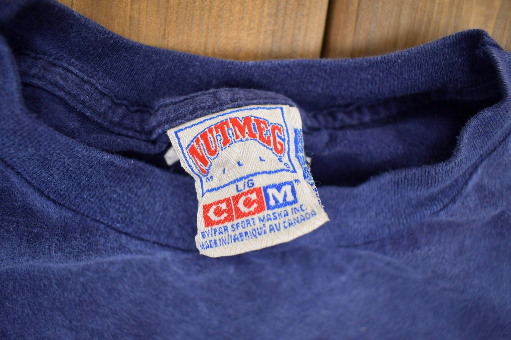 CCM Clothing > Gender Neutral Adult Clothing > Tops & Tees > T Shirts Vintage 1990s NHL Nutmeg Toronto Maple Leafs T-Shirt Made In Canada Men's Large