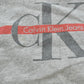 Vintage 1990s Calvin Klein Jeans Logo Graphic T-Shirt Men's XL