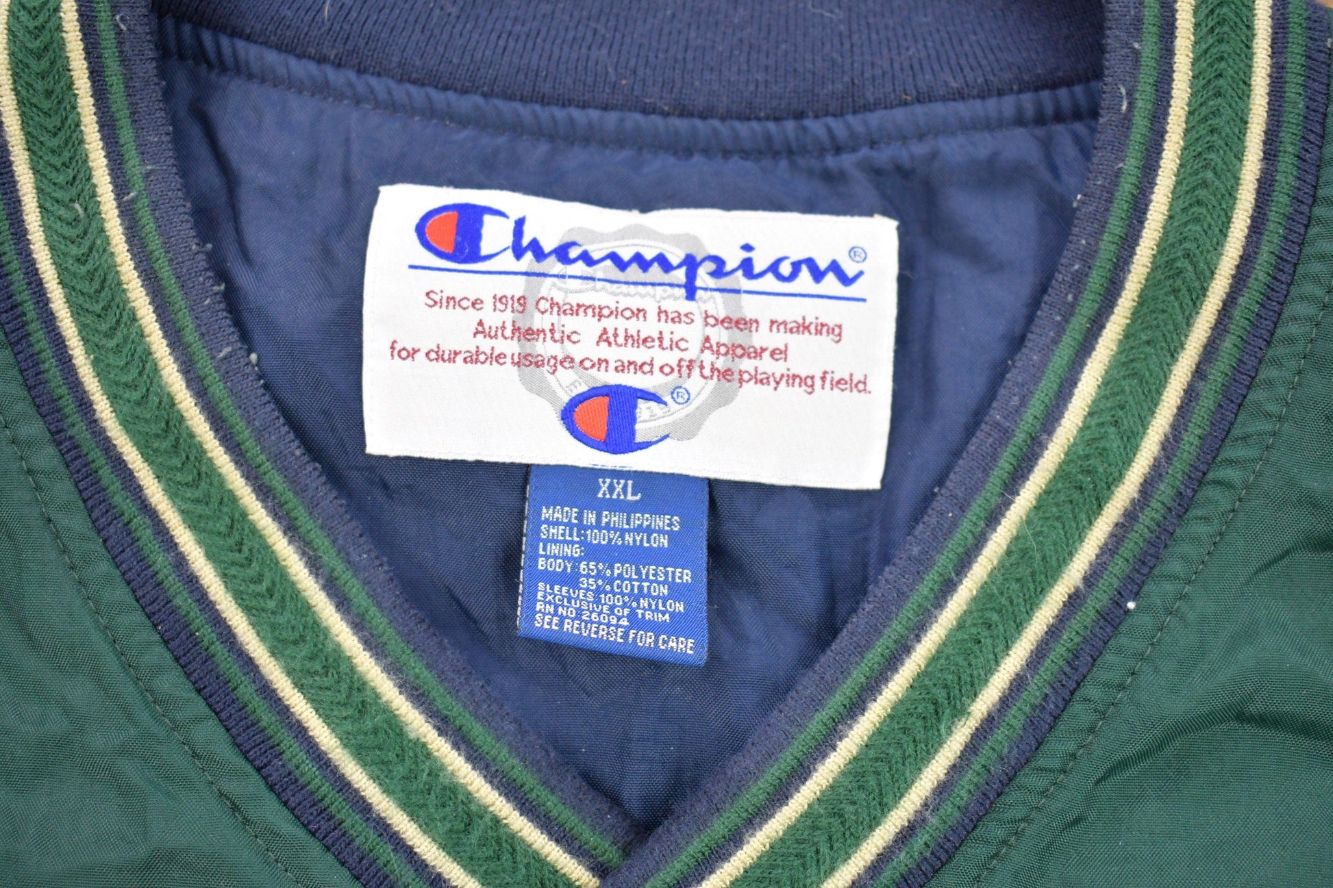 Champion Clothing > Gender Neutral Adult Clothing > Jackets & Coats Vintage 1990s Champion Notre Dame Graphic Windbreaker Jacket Men's 2XL