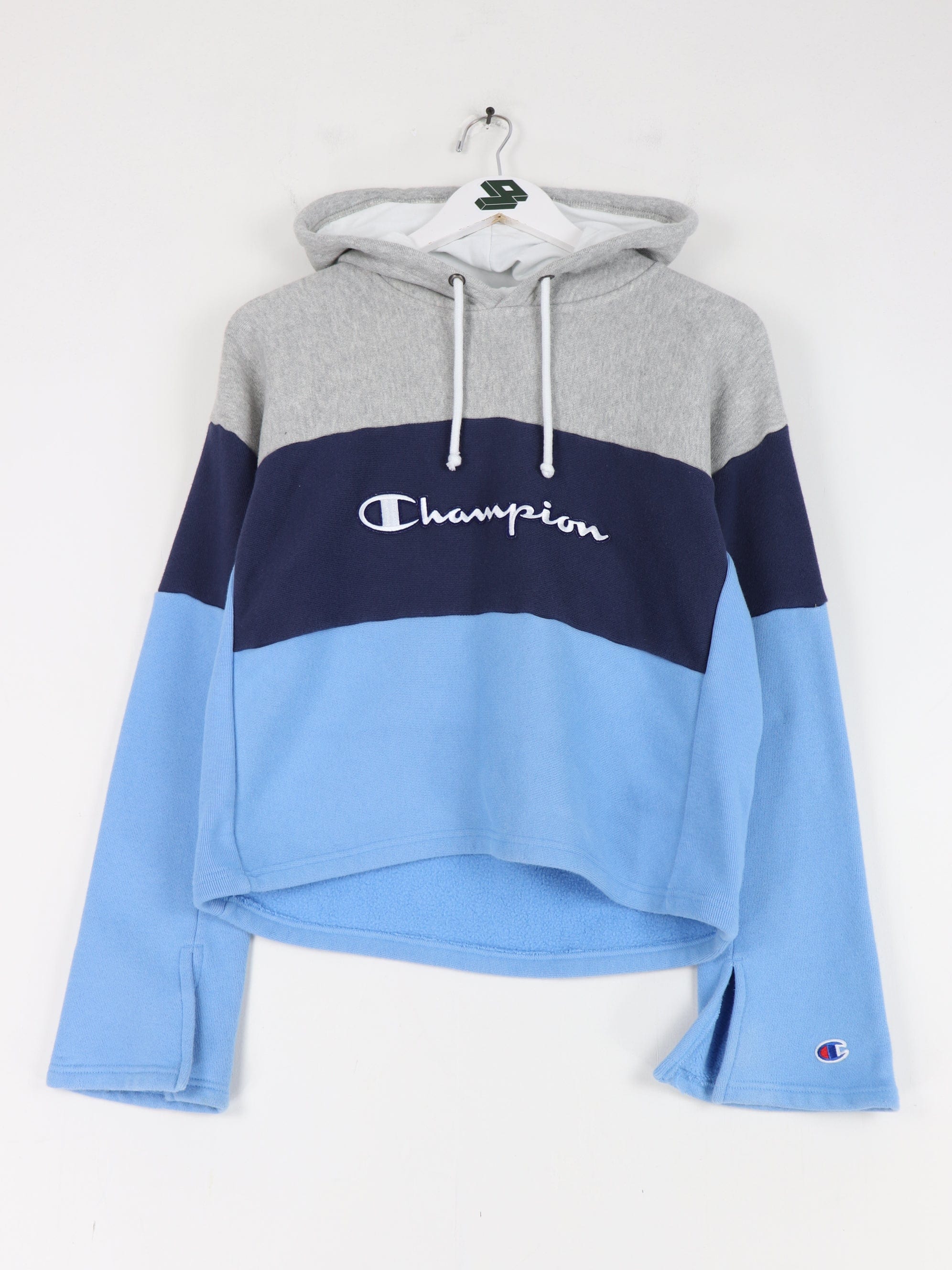 https://propervintagecanada.com/cdn/shop/files/champion-sweatshirts-hoodies-champion-sweatshirt-womens-medium-blue-cropped-reverse-weave-hoodie-31223398826043.jpg?v=1686267141