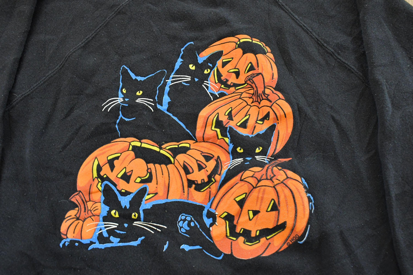 Vintage 1990s Halloween Pumpkin Raglan Crewneck Sweatshirt Men's M-L