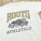 Vintage 1990s Roots Athletics Graphic T-Shirt Men's M