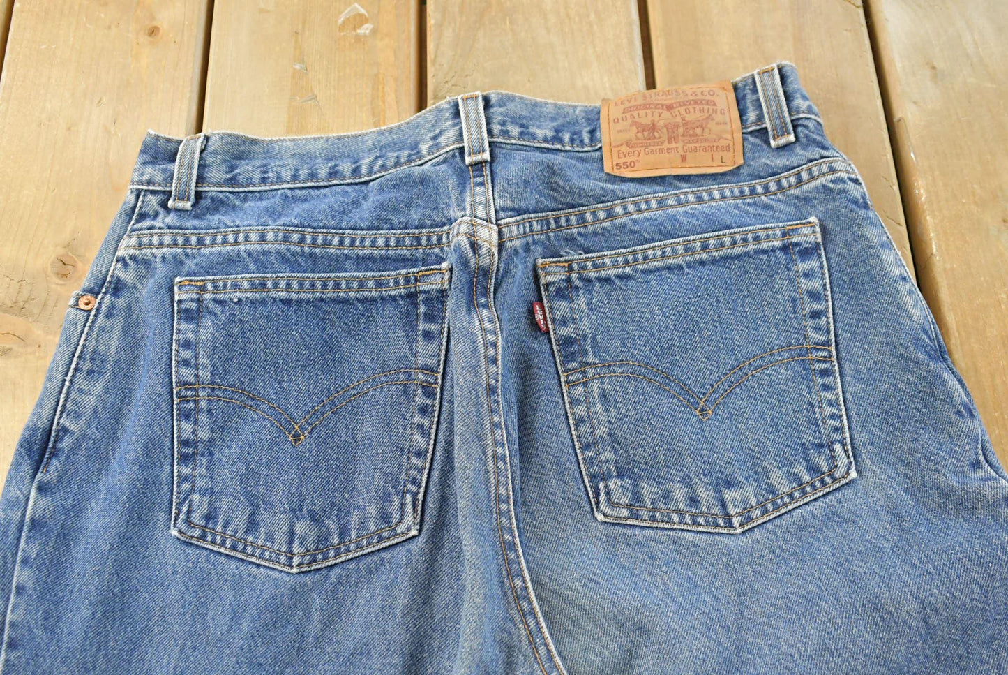 Vintage 1990s Levi's Distressed 550 Relaxed Fit Denim Jeans Women's 33 x 32.5