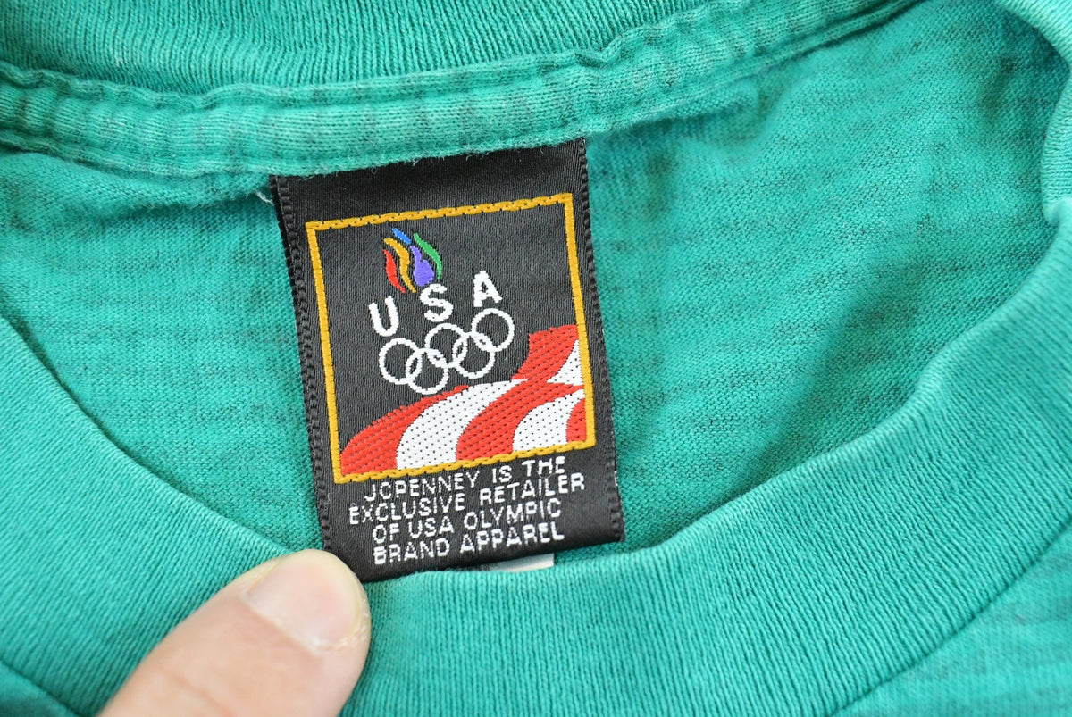 Vintage 1990s USA Olympic Rings JC Penney Micro Stripe Teal T-Shirt Men's L
