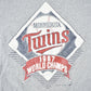 MLB Clothing > Gender Neutral Adult Clothing > Tops & Tees > T Shirts Vintage 1987 Minnesota Twins MLB World Champions Graphic T-Shirt Men's Medium