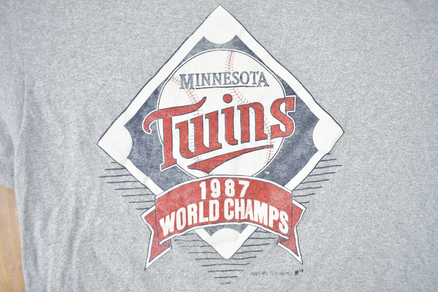 MLB Clothing > Gender Neutral Adult Clothing > Tops & Tees > T Shirts Vintage 1987 Minnesota Twins MLB World Champions Graphic T-Shirt Men's Medium