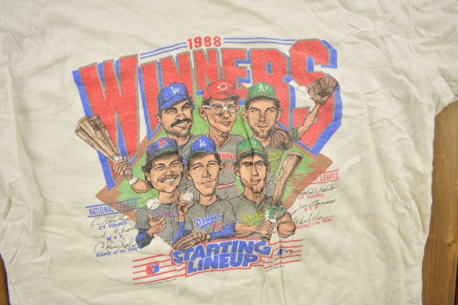 MLB Clothing > Gender Neutral Adult Clothing > Tops & Tees > T Shirts Vintage 1988 MLB Winners Starting Lineup Graphic T-Shirt Youth M Men's Medium