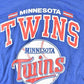MLB Clothing > Gender Neutral Adult Clothing > Tops & Tees > T Shirts Vintage 1989 Minnesota Twins MLB Graphic T-Shirt Men's L