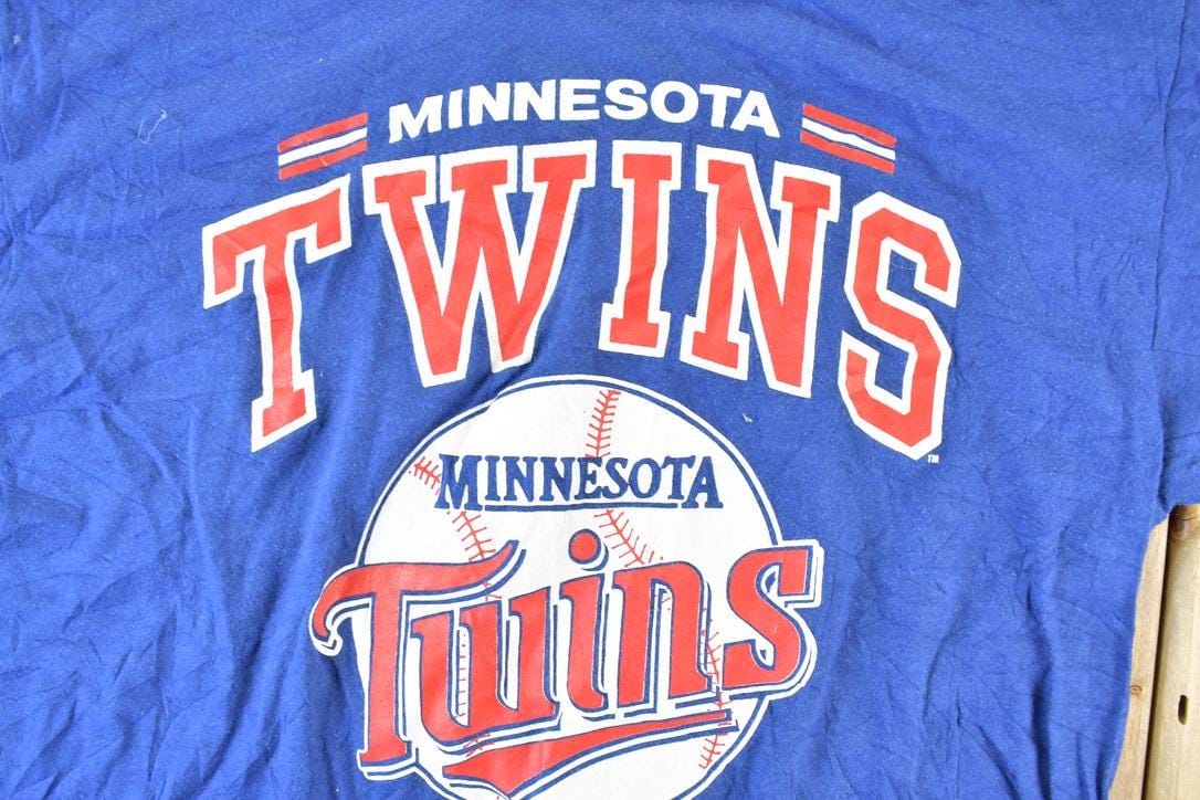 MLB Clothing > Gender Neutral Adult Clothing > Tops & Tees > T Shirts Vintage 1989 Minnesota Twins MLB Graphic T-Shirt Men's L
