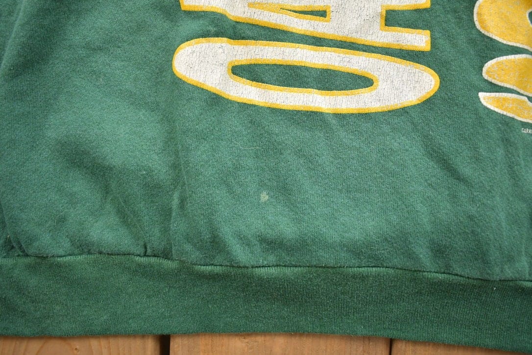 MLB Clothing > Gender Neutral Adult Clothing > Tops & Tees > T Shirts Vintage 1989 Oakland Athletics MLB Graphic Raglan T-Shirt Men's XL