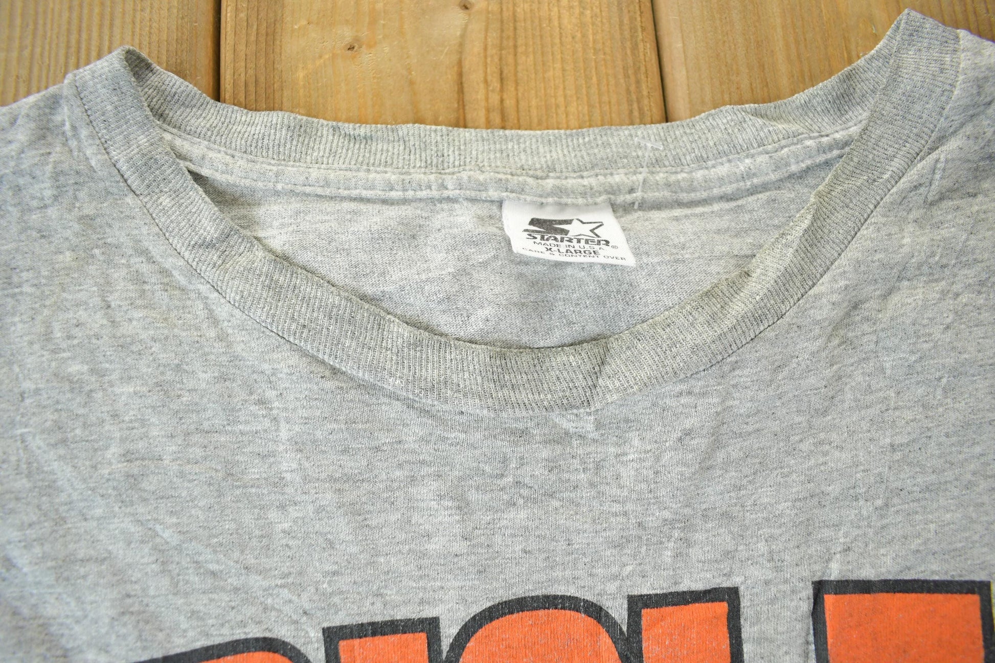 MLB Clothing > Gender Neutral Adult Clothing > Tops & Tees > T Shirts Vintage 1990s Baltimore Orioles MLB Graphic T-Shirt Men's XL