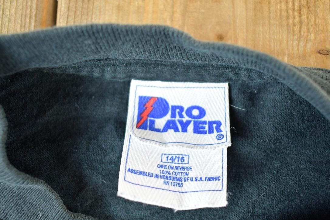 MLB Clothing > Gender Neutral Adult Clothing > Tops & Tees > T Shirts Vintage 1990s Cal Ripken Jr MLB Graphic T-Shirt Youth S