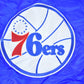 NBA Clothing > Gender Neutral Adult Clothing > Jackets & Coats Vintage 1990s Deadstock NBA Hardwood Classics Philadelphia 76ers Satin Button Up Windbreaker Basketball Jacket
