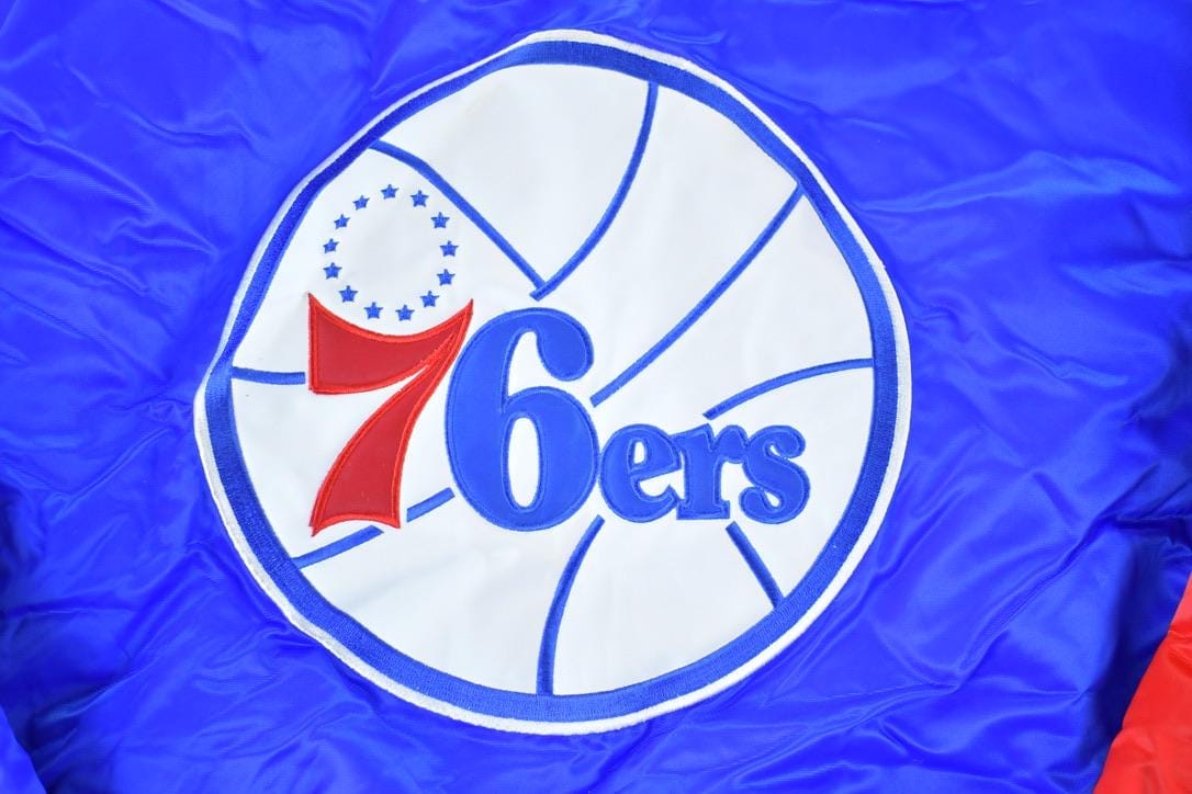 NBA Clothing > Gender Neutral Adult Clothing > Jackets & Coats Vintage 1990s Deadstock NBA Hardwood Classics Philadelphia 76ers Satin Button Up Windbreaker Basketball Jacket