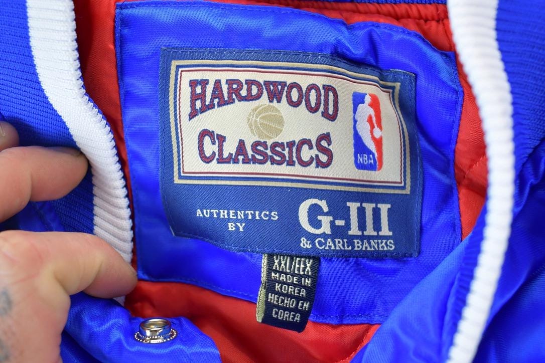 NBA Clothing > Gender Neutral Adult Clothing > Jackets & Coats Vintage 1990s Deadstock NBA Hardwood Classics Philadelphia 76ers Satin Button Up Windbreaker Basketball Jacket