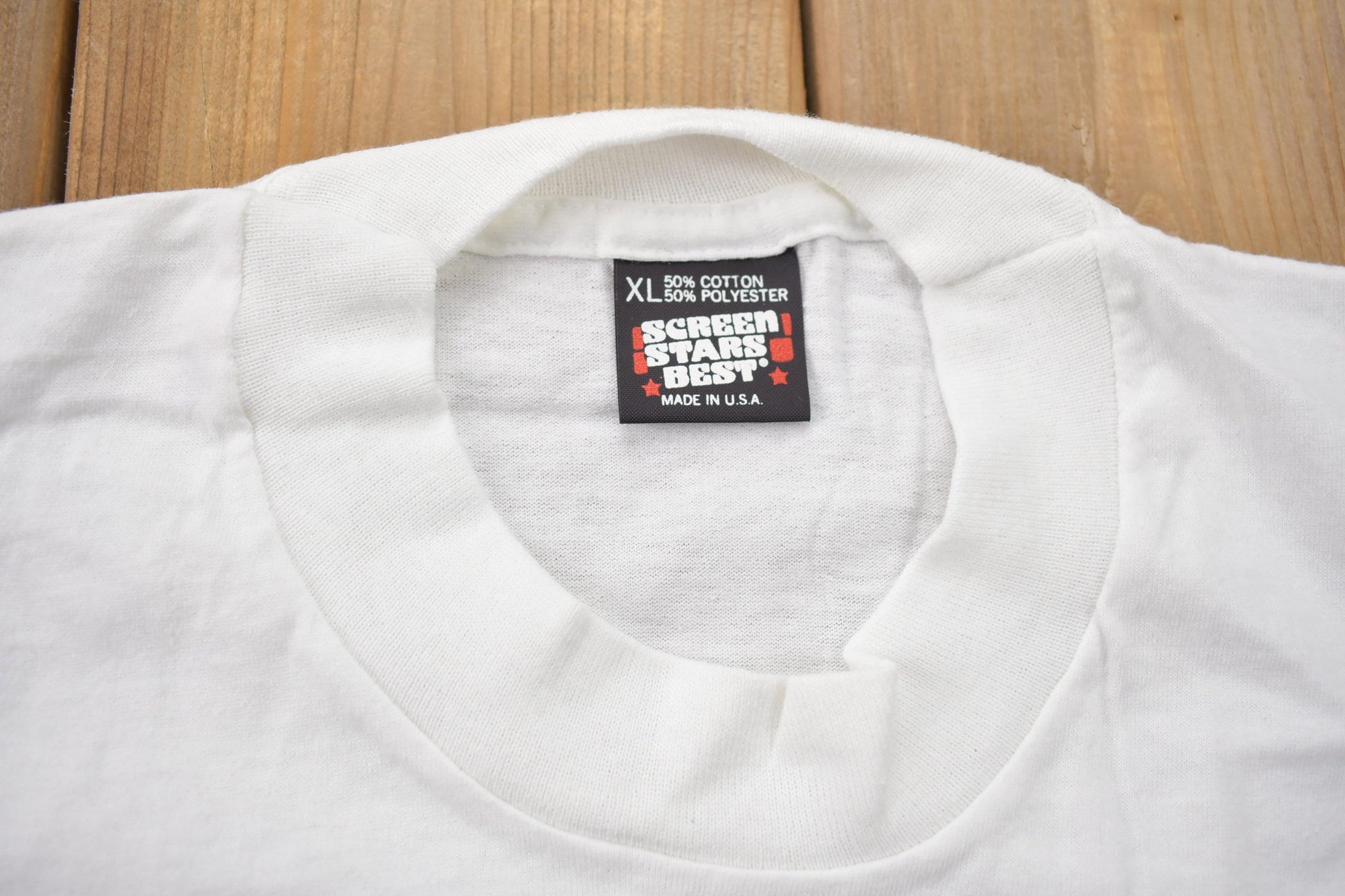 NBA Clothing > Gender Neutral Adult Clothing > Tops & Tees > T Shirts Vintage 1989 Detroit Pistons NBA World Champs Big Head Graphic T-Shirt Men's Large/ Made In USA / Single Stitch / NBA Basketball / Motor City Bad Boys