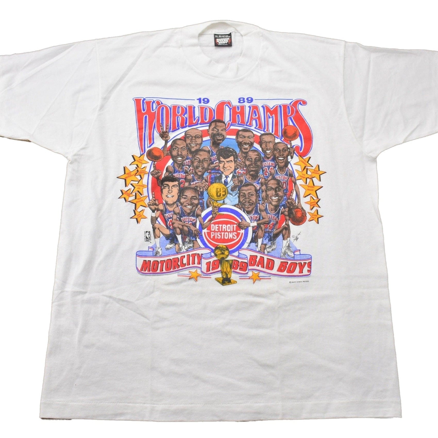 NBA Clothing > Gender Neutral Adult Clothing > Tops & Tees > T Shirts Vintage 1989 Detroit Pistons NBA World Champs Big Head Graphic T-Shirt Men's Large/ Made In USA / Single Stitch / NBA Basketball / Motor City Bad Boys