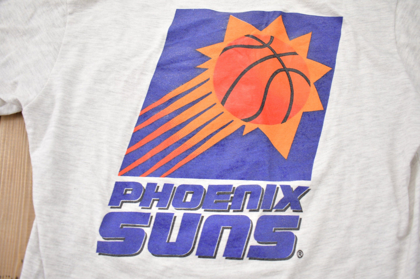 NBA Clothing > Gender Neutral Adult Clothing > Tops & Tees > T Shirts Vintage 1990s Phoenix Suns NBA Graphic Button Up T-Shirt Men's Small/ Made In USA / Single Stitch / NBA Basketball / 90s Streetwear / Sportswear