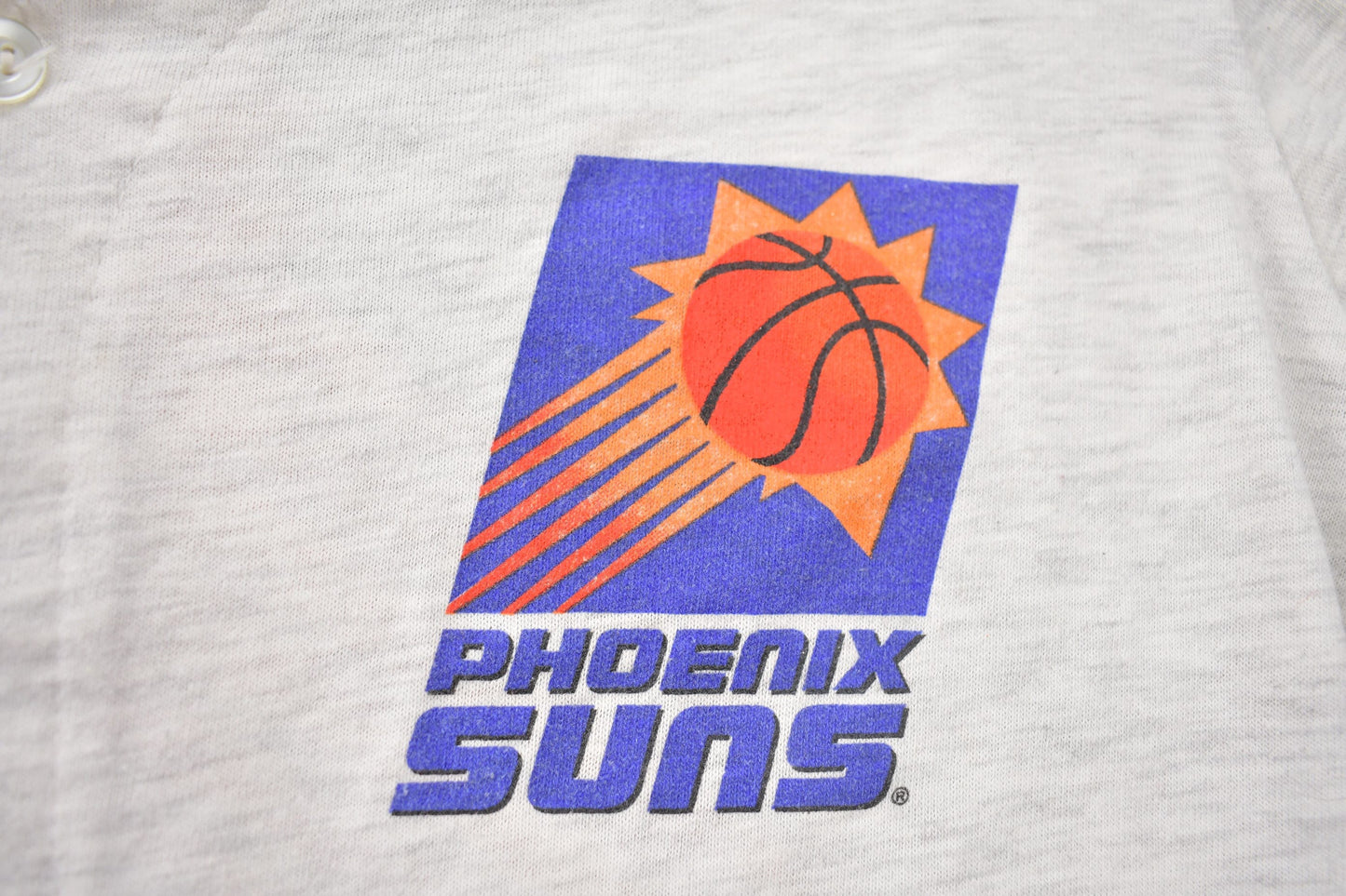 NBA Clothing > Gender Neutral Adult Clothing > Tops & Tees > T Shirts Vintage 1990s Phoenix Suns NBA Graphic Button Up T-Shirt Men's Small/ Made In USA / Single Stitch / NBA Basketball / 90s Streetwear / Sportswear