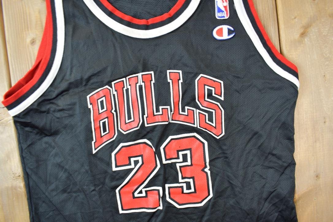 NBA Clothing > Men's Clothing > Sports & Fitness Vintage 1990s Michael Jordan Chicago Bulls NBA Champion Youth Sized Jersey / 90s NBA Jersey / Chicago Bulls Sportswear