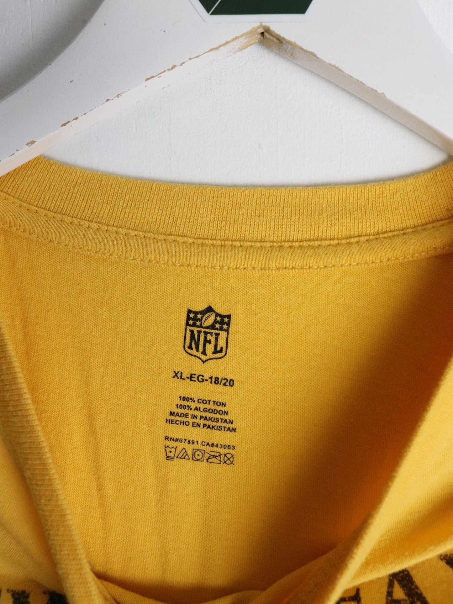 New Orleans Saints T Shirt Youth XL Yellow NFL from propervintagecanada