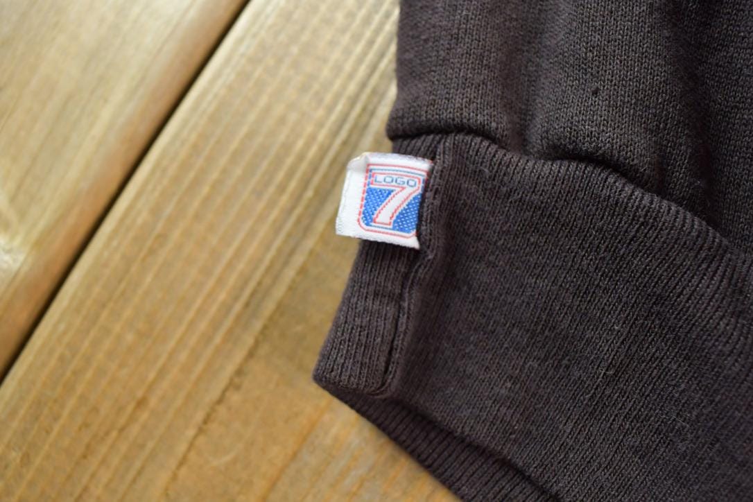 NFL Clothing > Gender Neutral Adult Clothing > Hoodies & Sweatshirts > Sweatshirts Vintage 1980s Cleveland Browns NFL Crewneck Sweatshirt Men's Medium/ Football / Sportswear / Americana