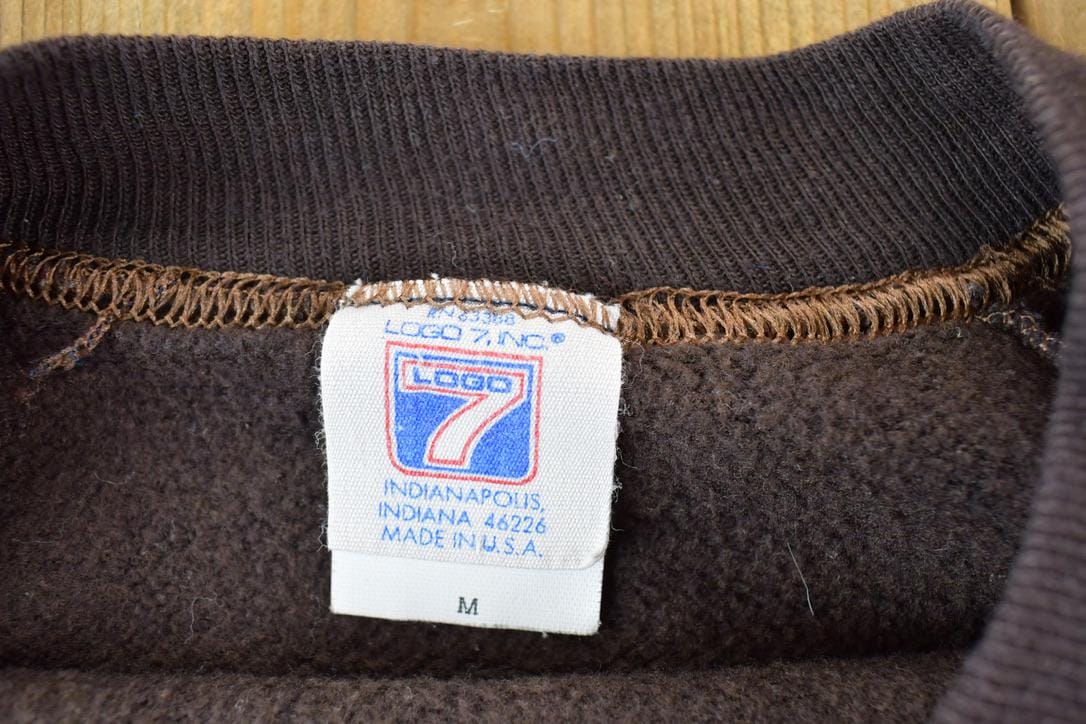 NFL Clothing > Gender Neutral Adult Clothing > Hoodies & Sweatshirts > Sweatshirts Vintage 1980s Cleveland Browns NFL Crewneck Sweatshirt Men's Medium/ Football / Sportswear / Americana