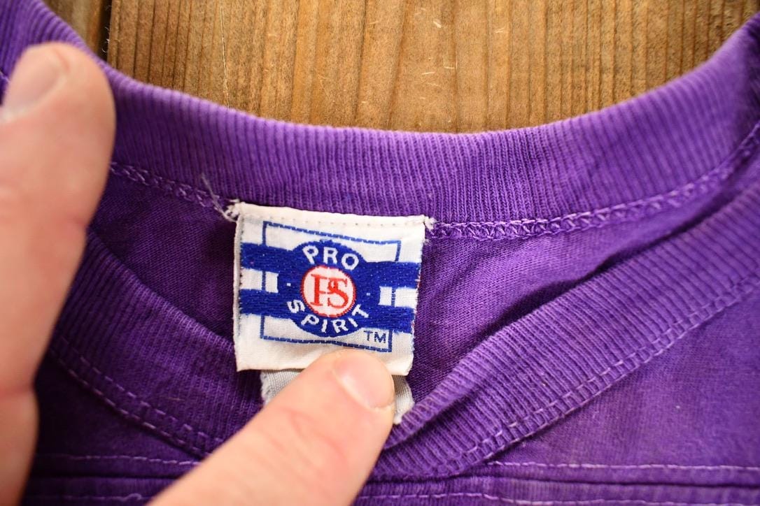 NFL Clothing > Gender Neutral Adult Clothing > Hoodies & Sweatshirts > Sweatshirts Vintage 1993 Vikings Bugs Bunny Marvin The Martian NFL Cartoon Crewneck Sweatshirt Men's S