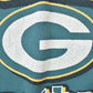 NFL Clothing > Gender Neutral Adult Clothing > Tops & Tees > T Shirts Vintage 1980s Green Bay Packers NFL Graphic T-Shirt Youth M