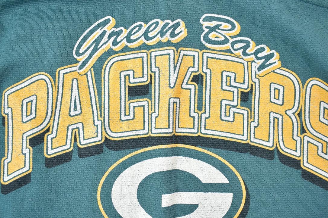 NFL Clothing > Gender Neutral Adult Clothing > Tops & Tees > T Shirts Vintage 1980s Green Bay Packers NFL Graphic T-Shirt Youth M